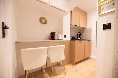 Cuisine ou kitchenette dans l'établissement Cosy flat / Tour Eiffel Area