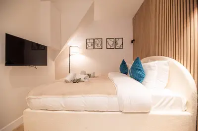 Un ou plusieurs lits dans un hébergement de l'établissement Cosy flat / Tour Eiffel Area