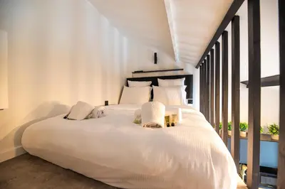 Un ou plusieurs lits dans un hébergement de l'établissement Lovely Nest in Paris