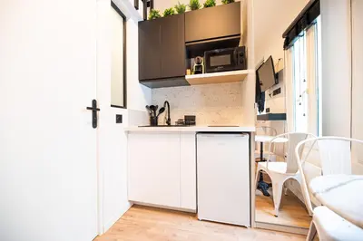 Cuisine ou kitchenette dans l'établissement Lovely Nest in Paris