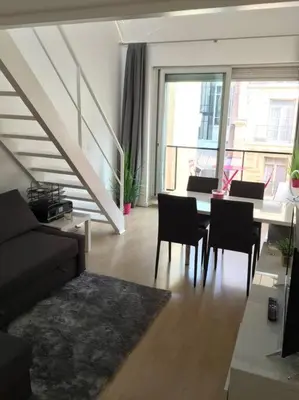 Coin salon dans l'établissement Duplex près des Champs-Élysées