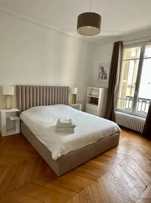 Un ou plusieurs lits dans un hébergement de l'établissement Splendide Appartement au coeur de St Germain / Odéon