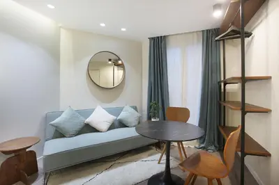 Un ou plusieurs lits dans un hébergement de l'établissement Studio Sacré coeur by Studio prestige