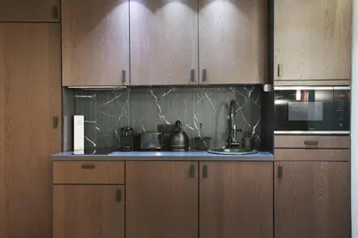 Cuisine ou kitchenette dans l'établissement Studio Sacré coeur by Studio prestige