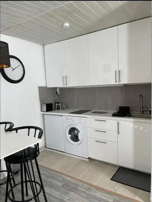 Cuisine ou kitchenette dans l'établissement Eiffel Tour - Cosy Parisien
