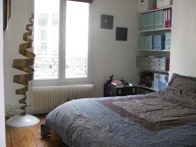 Un ou plusieurs lits dans un hébergement de l'établissement Stylish Flat with Balcony Facing South