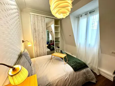 Un ou plusieurs lits dans un hébergement de l'établissement Champs-Elysées - Suite for 2 people