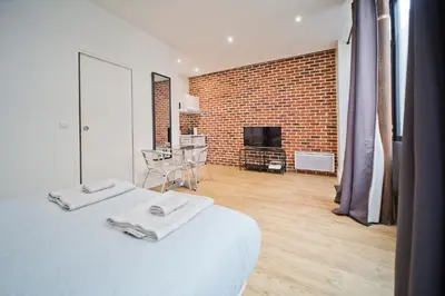 Télévision ou salle de divertissement dans l'établissement Loft style apartment