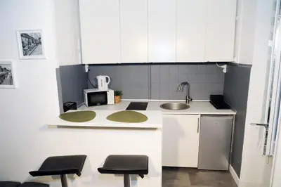 Cuisine ou kitchenette dans l'établissement Eiffel Tour Cosy Oliver