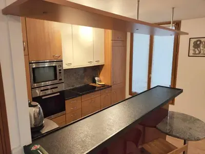 Cuisine ou kitchenette dans l'établissement Appartement Faubourg Montmartre CityCosy