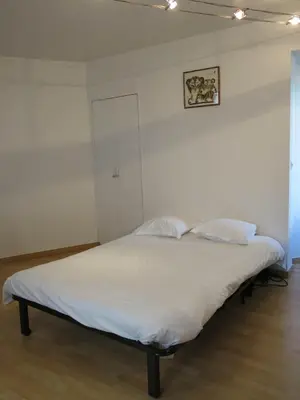 Un ou plusieurs lits dans un hébergement de l'établissement Appartement Faubourg Montmartre CityCosy