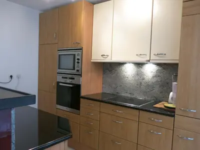 Cuisine ou kitchenette dans l'établissement Appartement Faubourg Montmartre CityCosy