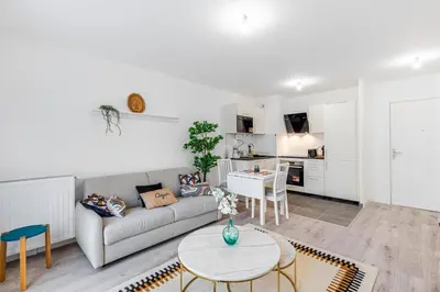 Coin salon dans l'établissement GuestReady - Bel Apt. à Asnières-sur-Seine