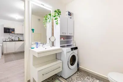 Cuisine ou kitchenette dans l'établissement GuestReady - Bel Apt. à Asnières-sur-Seine