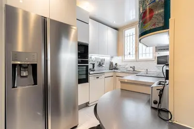 Cuisine ou kitchenette dans l'établissement GuestReady - A Slice of Parisian Paradise