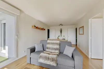 Coin salon dans l'établissement Chic apartment with superb view of the eiffel tower