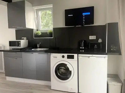 Cuisine ou kitchenette dans l'établissement Eiffel Tour - Cosy Daisy
