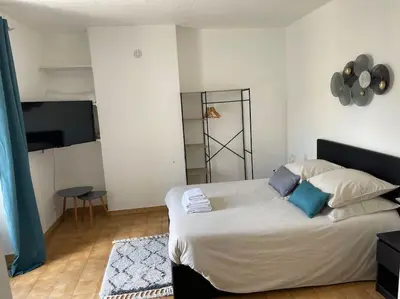 Un ou plusieurs lits dans un hébergement de l'établissement Eiffel Tour Cosy blue
