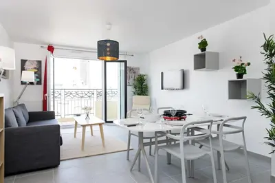 Coin salon dans l'établissement Magnifique appartement à proximité de Paris
