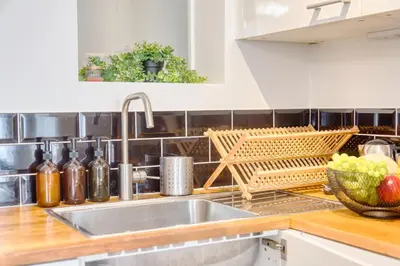 Cuisine ou kitchenette dans l'établissement *Appartement Moderne/2 minutes du métro*