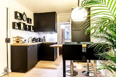 Cuisine ou kitchenette dans l'établissement Montmartre superbe moderne appartement 4 personnes