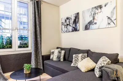 Coin salon dans l'établissement Montmartre superbe moderne appartement 4 personnes