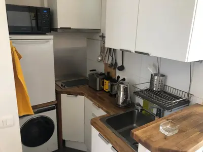 Cuisine ou kitchenette dans l'établissement 2 pièces sous les toits 6 personnes calme lumineux équipé