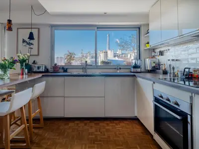 Cuisine ou kitchenette dans l'établissement Eiffel Tower Design residence