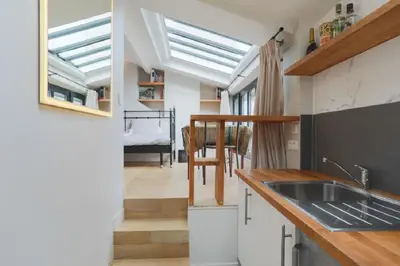 Cuisine ou kitchenette dans l'établissement Amazing Mazarine Studio