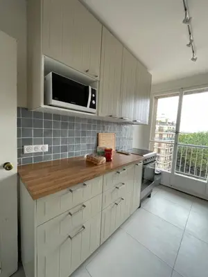 Cuisine ou kitchenette dans l'établissement Appartement sur quai de Seine