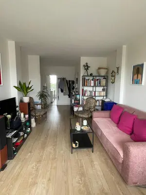 Coin salon dans l'établissement Appartement sur quai de Seine