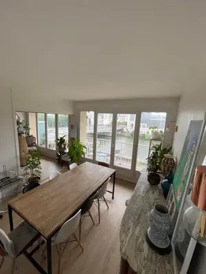 Télévision ou salle de divertissement dans l'établissement Appartement sur quai de Seine