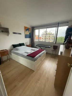 Un ou plusieurs lits dans un hébergement de l'établissement Appartement sur quai de Seine