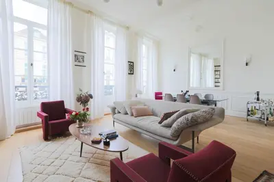 Coin salon dans l'établissement Chic flat Place des Vosges