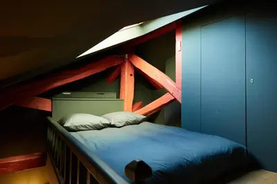 Un ou plusieurs lits dans un hébergement de l'établissement Flat Center Paris Louvre