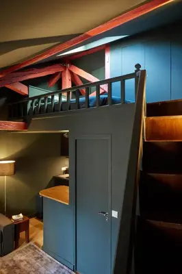 Un ou plusieurs lits dans un hébergement de l'établissement Flat Center Paris Louvre