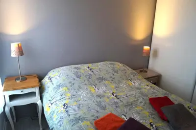Un ou plusieurs lits dans un hébergement de l'établissement Appartement calme et lumineux à 5 mn de Paris