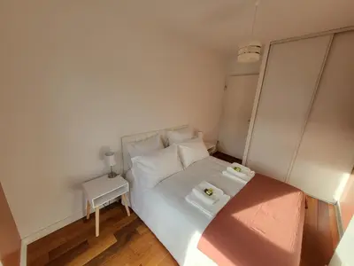 Un ou plusieurs lits dans un hébergement de l'établissement Paris Montmartre Chic