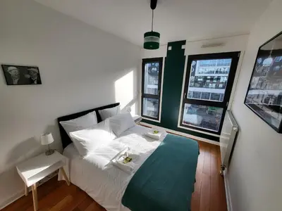 Un ou plusieurs lits dans un hébergement de l'établissement Paris Montmartre Chic