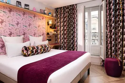Un ou plusieurs lits dans un hébergement de l'établissement Hotel Locomo - Gare de Lyon Bastille