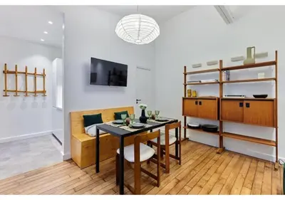 Un ou plusieurs lits dans un hébergement de l'établissement Apartment in the center of Paris by Studio prestige