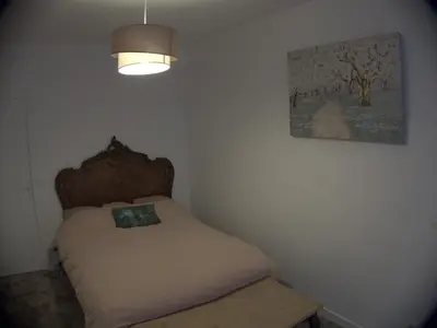 Un ou plusieurs lits dans un hébergement de l'établissement Beauty of Paris