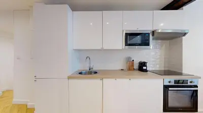 Cuisine ou kitchenette dans l'établissement 200 Suite DDJ - Superbe Appartement à Paris