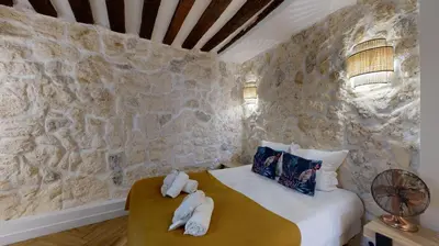 Un ou plusieurs lits dans un hébergement de l'établissement 200 Suite DDJ - Superbe Appartement à Paris