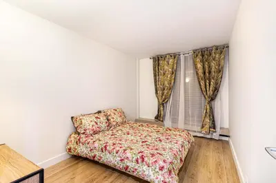 Un ou plusieurs lits dans un hébergement de l'établissement GuestReady - Bel Apt. près de la Place d'Italie