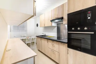 Cuisine ou kitchenette dans l'établissement GuestReady - Bel Apt. près de la Place d'Italie