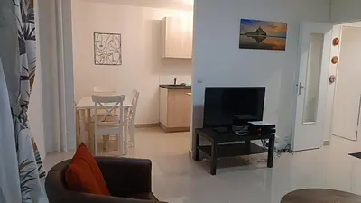 Télévision ou salle de divertissement dans l'établissement GuestReady - Bel Apt. près de la Place d'Italie