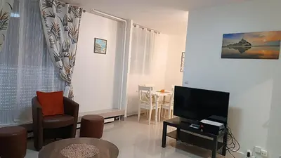 Télévision ou salle de divertissement dans l'établissement GuestReady - Bel Apt. près de la Place d'Italie