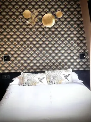 Un ou plusieurs lits dans un hébergement de l'établissement Chic & Cosy Eiffel Tower - Champs Elysées