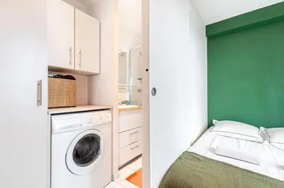Un ou plusieurs lits dans un hébergement de l'établissement GuestReady - Comfortable Cocoon near le Marais